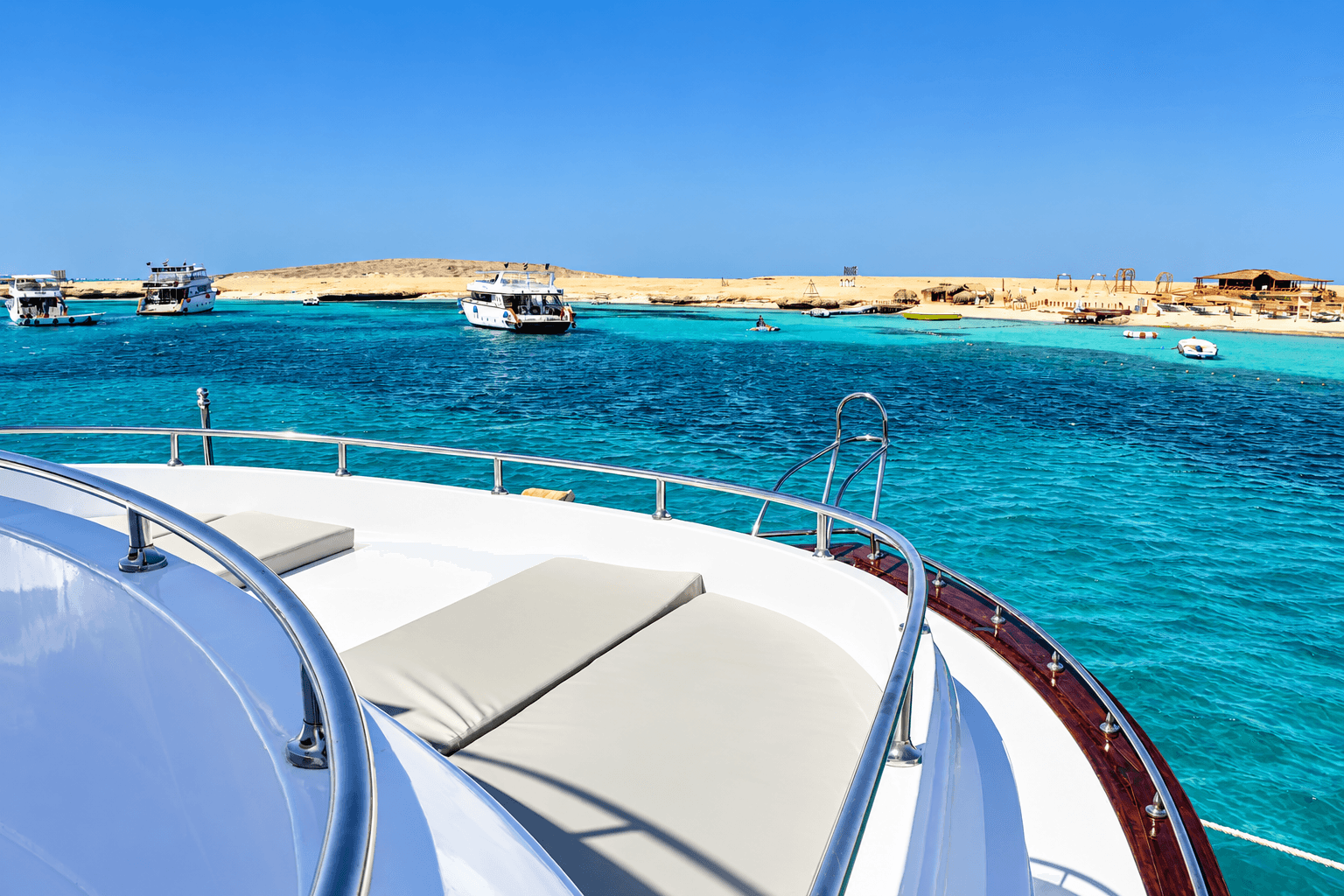Real daytime view from an unbranded boat in the Red Sea; exact party vessel is subject to confirmation