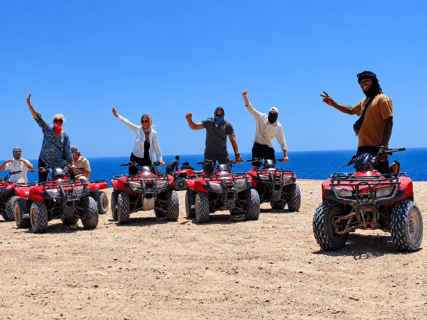 Group of riders on quad bikes overlooking the Red Sea near Hurghada